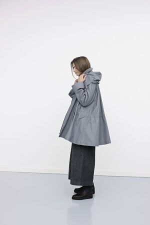 Light grey rainjacket with an A-line silhouette