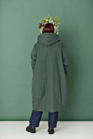 Bottle green long and loose coat with a balloon silhouette and a hood
