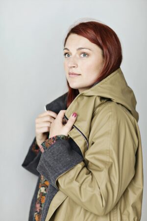 Olive raincoat with zipper and hood