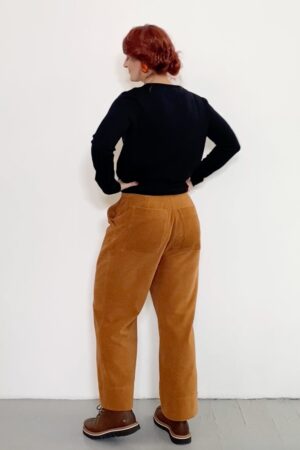 Mørk orange jeans i bredriflet fløjl