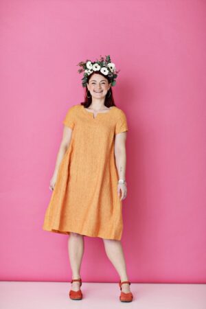 Orange linen dress with A-silhouette and short sleeves