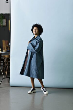 Blue oversize coat with press buttons