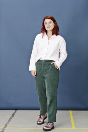 Green, wide-ribbed corduroy trousers