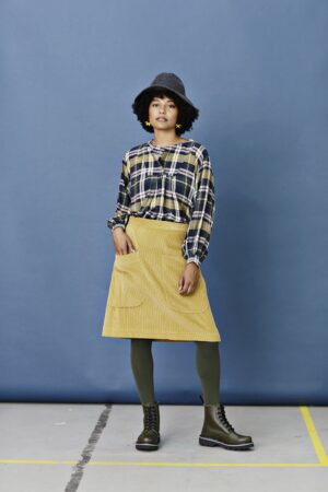 Short, yellow wide-ribbed corduroy skirt