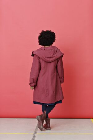Red coat with asymmetric zipper