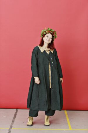 Dark green dress with colored buttons