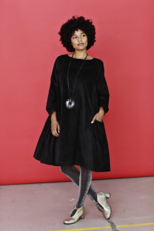 Black corduroy dress with A-line silhouette
