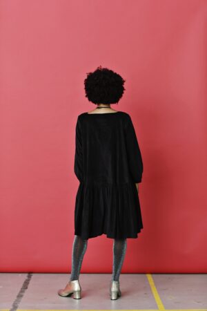 Black corduroy dress with A-line silhouette