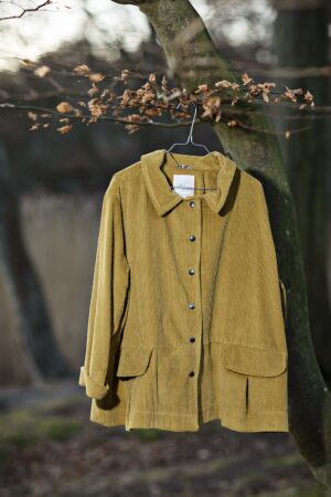 Yellow corduroy jacket with wide silhouette