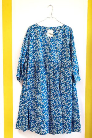Dress in blue small-flowered Liberty fabric